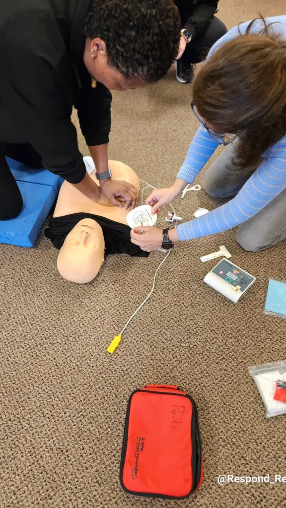 Students practicing CPR in a Respond and Rescue class